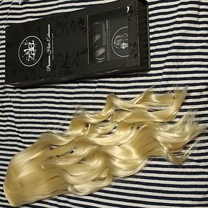 Zala high quality ponytail extension (can be heat styled).